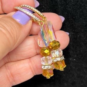 Iridescent twisted aurora Borealis earrings in rhinestone accented wires